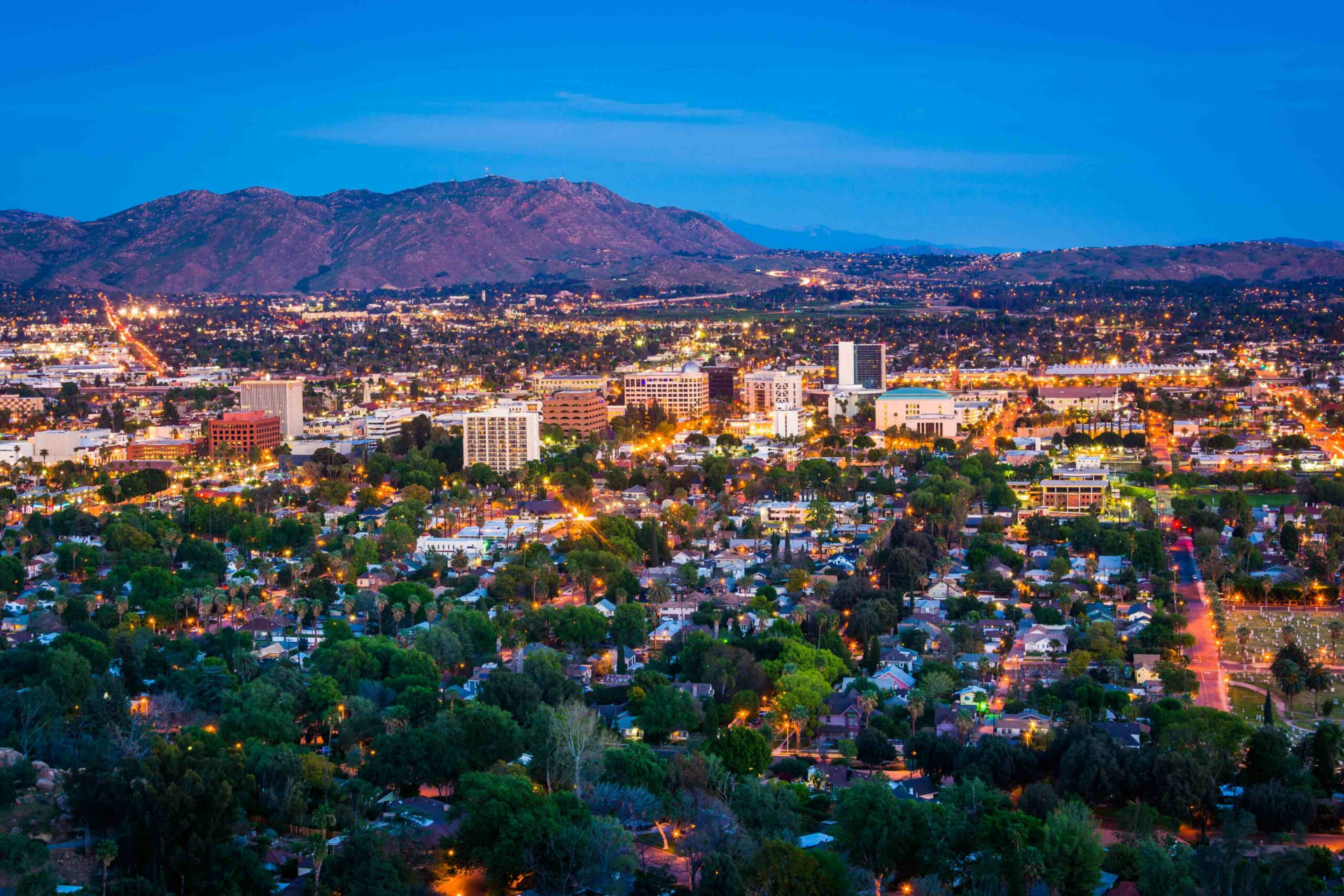 Aerial view of a commercial corridor at dusk