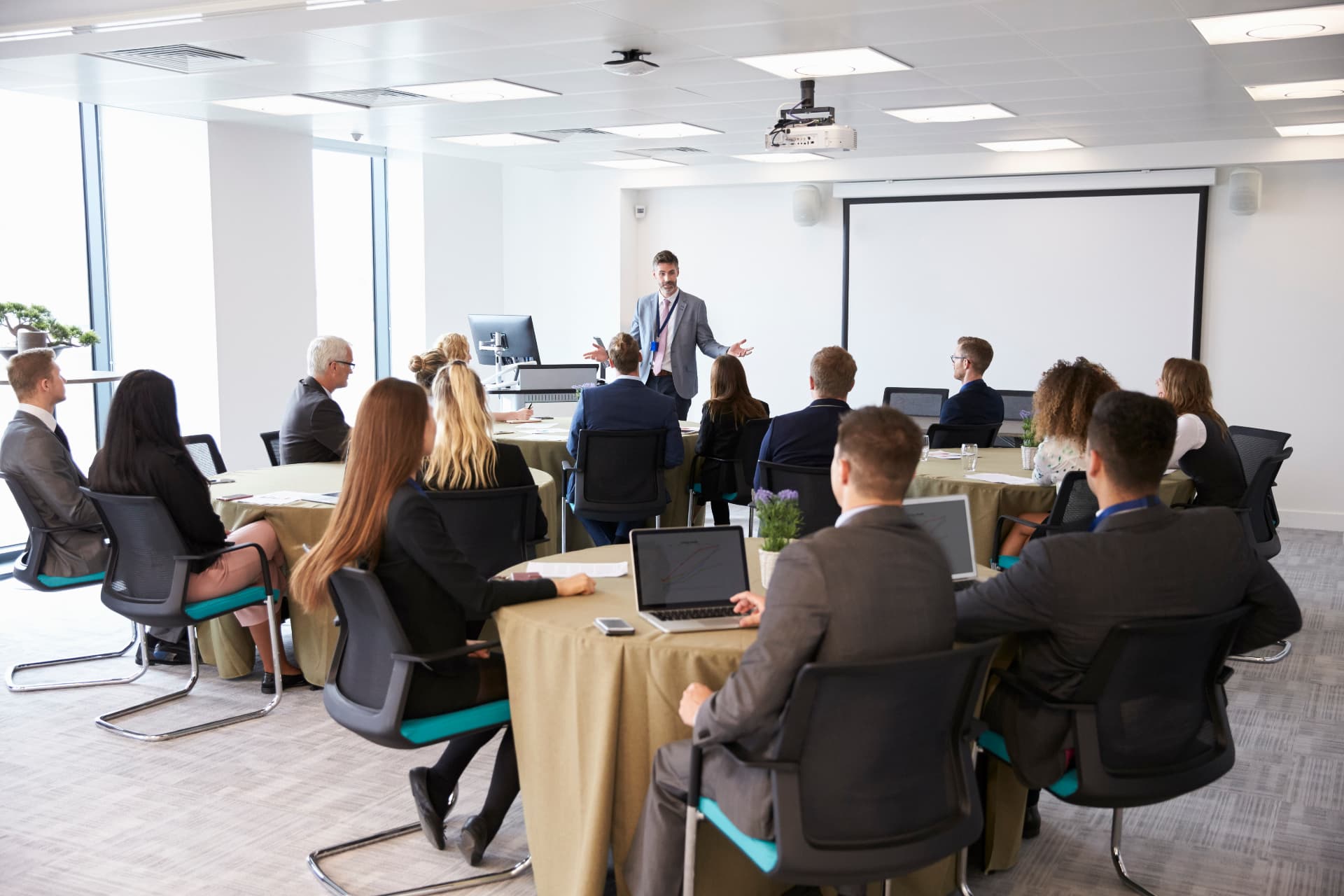 Public-sector staff and stakeholders in a briefing session