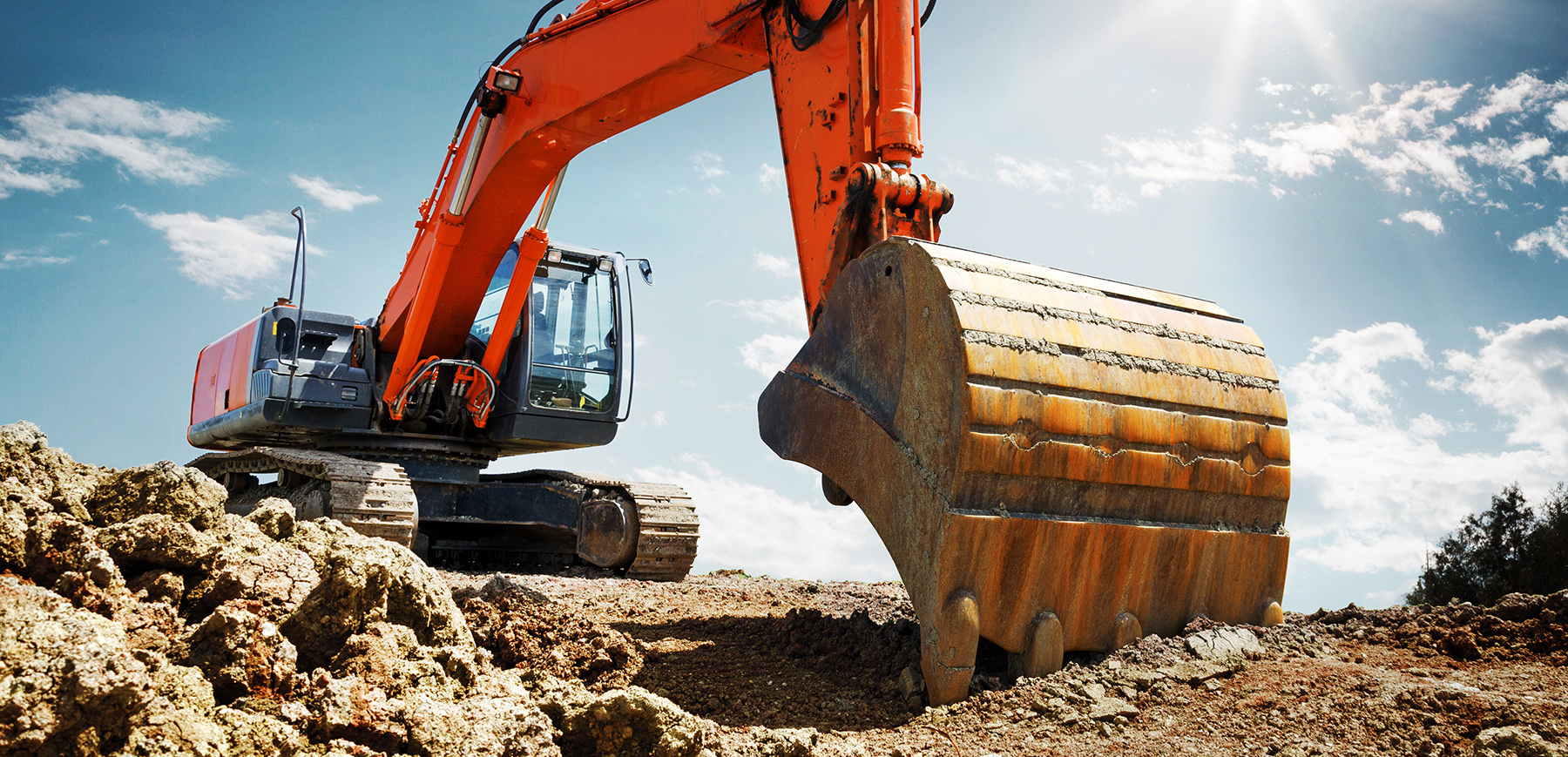 Groundwater monitoring wellheads and injection lines at a remediation site