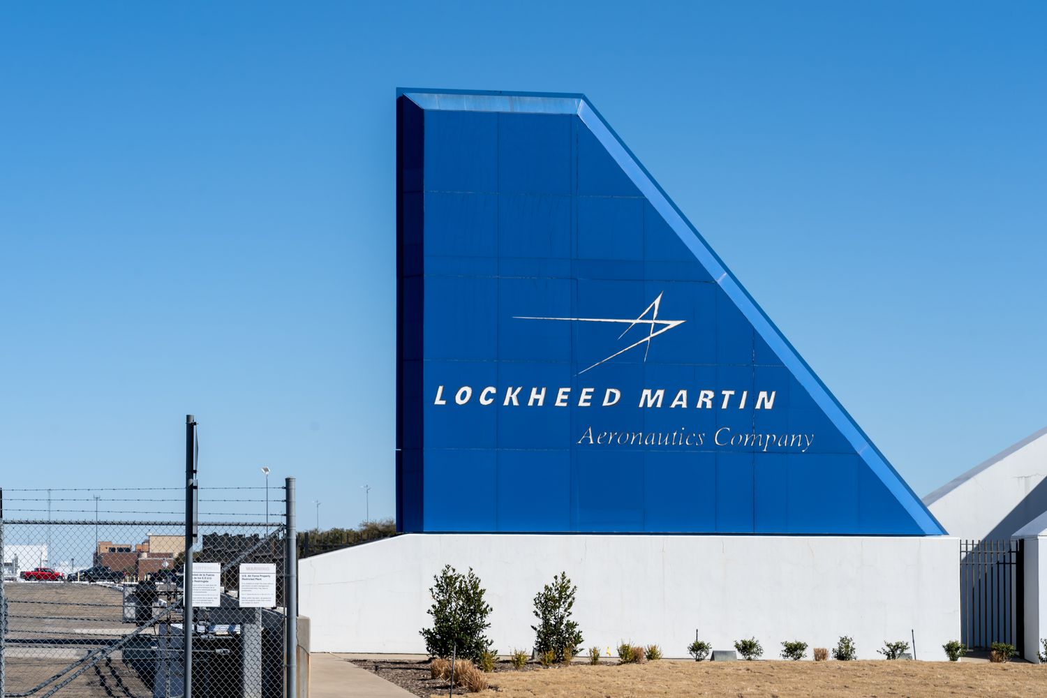 Lockheed Martin Aeronautics Company entrance sign against a clear sky