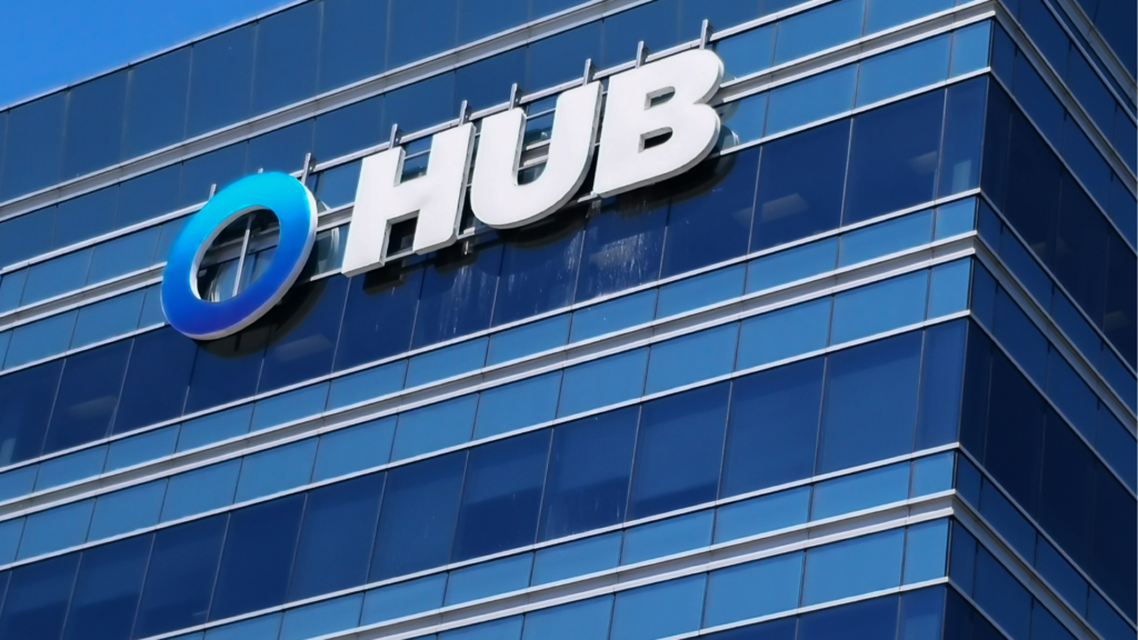 HUB International signage on a modern glass office building