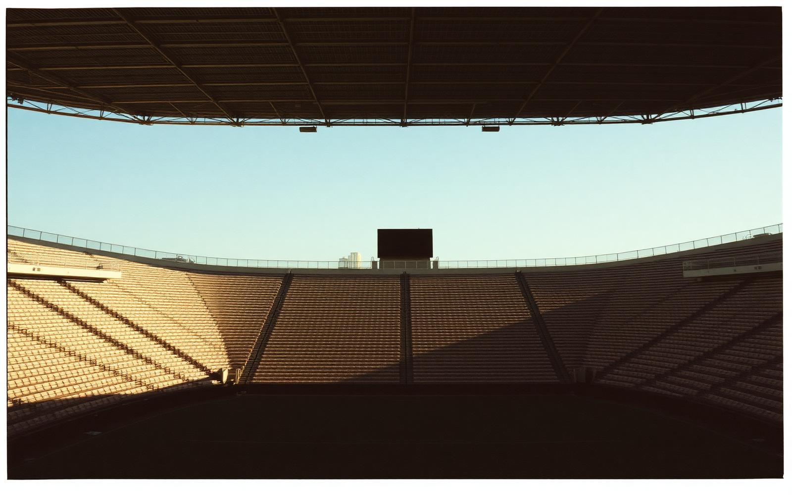 Stadium seating and shadows before an event